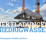 Schwere Projektladung wird am Birsterminal in ein Binnenschiff verladen